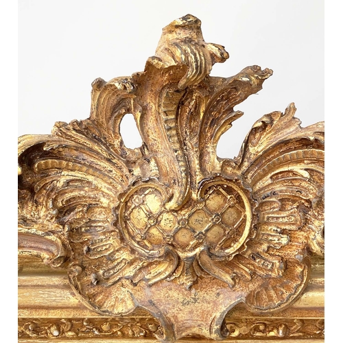 123 - OVERMANTEL MIRROR, French style gilded with arched bevelled mirror plate and foliate crest and frame... 