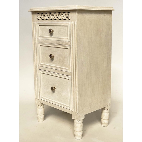 124 - BEDSIDE CHESTS, a pair, French style grey painted each with three drawers and pierced frieze, 40cm x... 