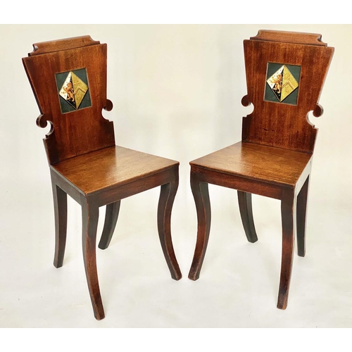 128 - HALL CHAIRS, a pair, Regency mahogany each heraldic panelled back and sabre front supports, 39cm W. ... 