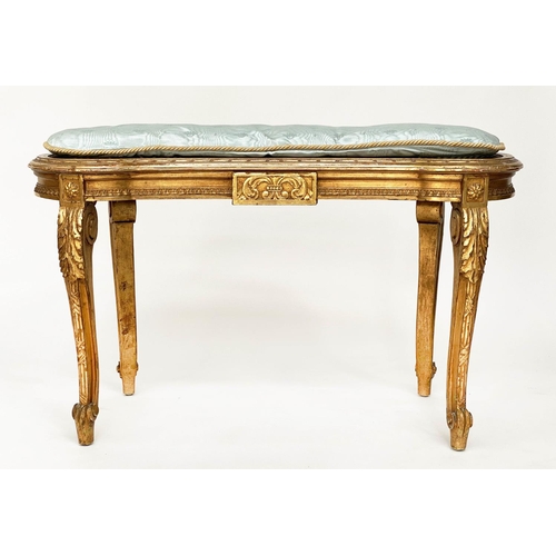 130 - WINDOW SEAT, early 20th century French transitional style giltwood of kidney form with cane seat and... 