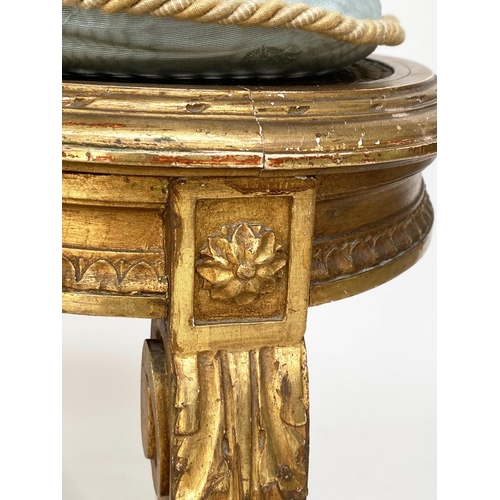 130 - WINDOW SEAT, early 20th century French transitional style giltwood of kidney form with cane seat and... 