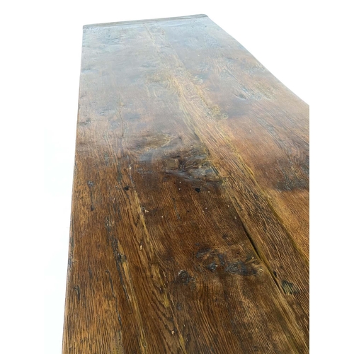 137 - DINING TABLE, antique English oak three plank cleated rectangular with shaped trestles and stretcher... 