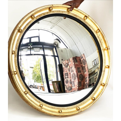 143 - CONVEX WALL MIRROR, Regency style giltwood with convex mirror plate, ebonised reeded slip and ball e... 