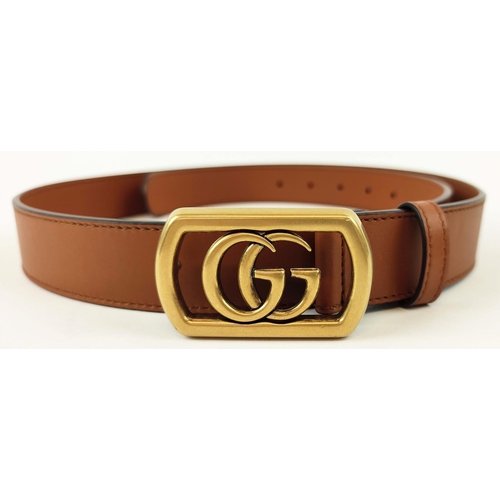 24 - GUCCI UNISEX FRAMED GG LOGO MARMONT BELT, framed GG logo on brass buckle with brown leather, size 10... 