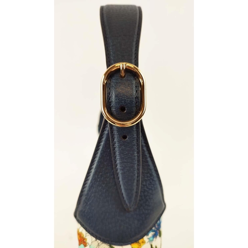 27 - GUCCI JACKIE FLORA HOBO BAG, fabric floral pattern by Vittorio Accornero and navy blue leather adjus... 