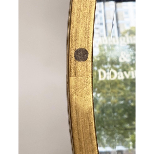 294 - CIRCULAR WALL MIRROR, gilt metal with bevelled mirror, 100cm W.