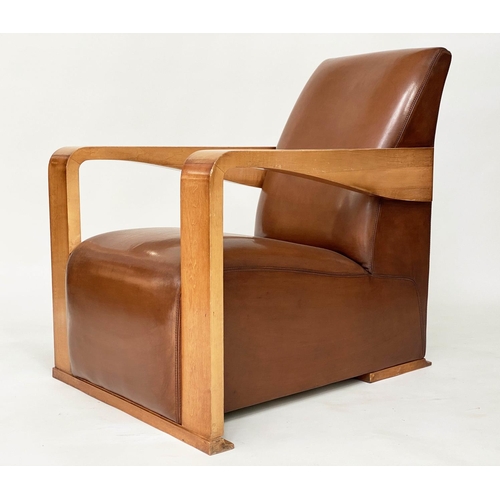 295 - HUGUES CHEVALIER YING ARMCHAIR, satinwood and stitched tan leather with broad down swept arms and ro... 