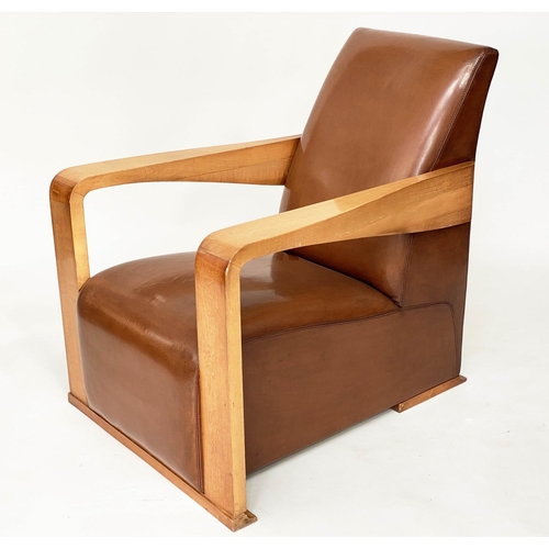 295 - HUGUES CHEVALIER YING ARMCHAIR, satinwood and stitched tan leather with broad down swept arms and ro... 