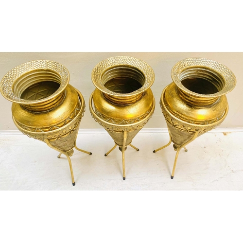 355 - VASES ON STANDS, set of three, tapered form, textured gilt metal, 58cm high, 22cm diameter. (3)