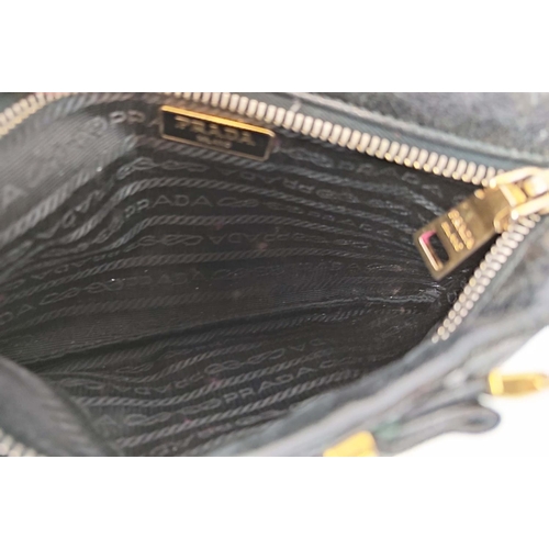 39 - PRADA VINTAGE WRISTLET CLUTCH, with bow front detail, gold tone hardware, top zip closure, adjustabl... 