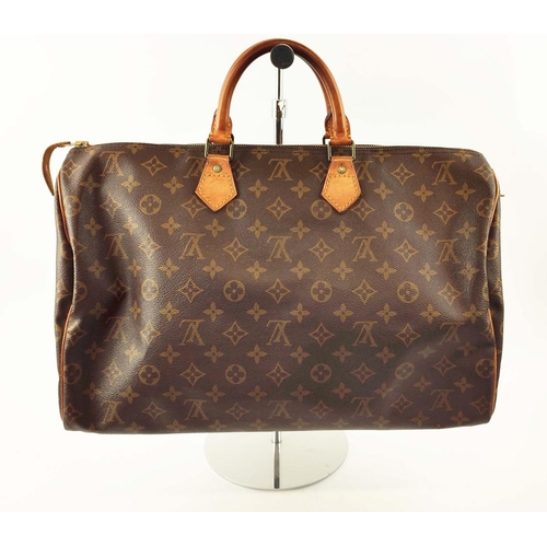 LOUIS VUITTON VINTAGE SPEEDY BAG, monogram coated canvas with leather trims  and two top handles, 40c