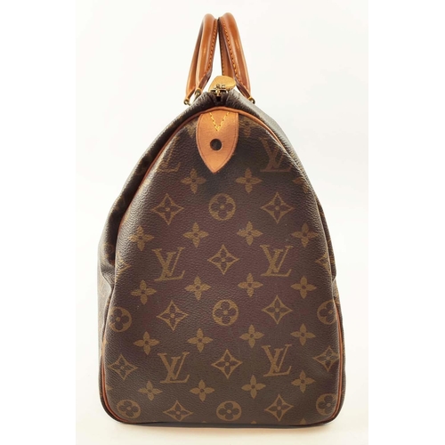 40 - LOUIS VUITTON VINTAGE SPEEDY BAG, monogram coated canvas with leather trims and two top handles, 40c... 