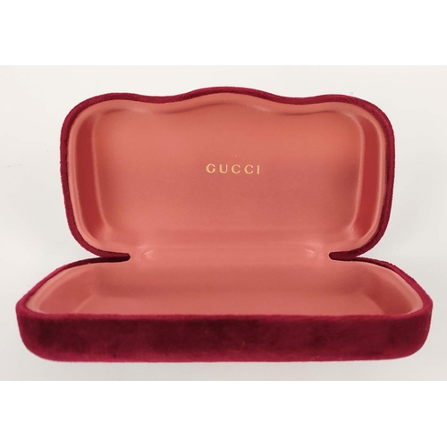 6 - GUCCI SUNGLASSES, gold tone and mother of pearl style arms, with amber coloured front detailing, wit... 