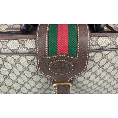 25A - GUCCI VINTAGE SUITCASE, buckle closure with iconic green and red web detailing, leather top handle, ... 