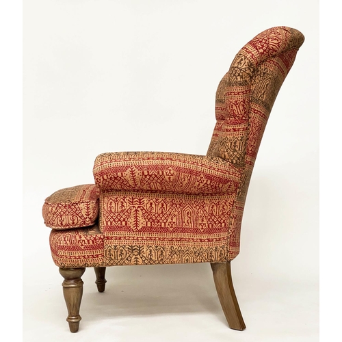 146 - ARMCHAIR, Victorian style deep buttoned spoon back, with Indian print upholstery.