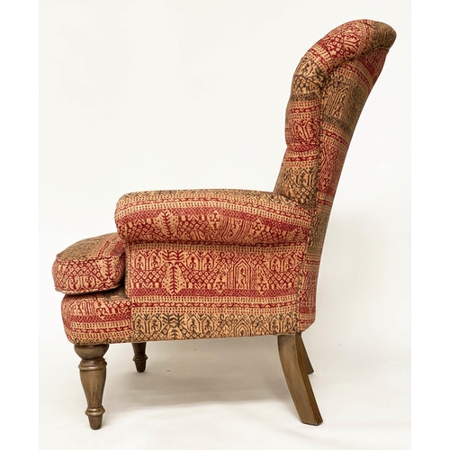 146 - ARMCHAIR, Victorian style deep buttoned spoon back, with Indian print upholstery.