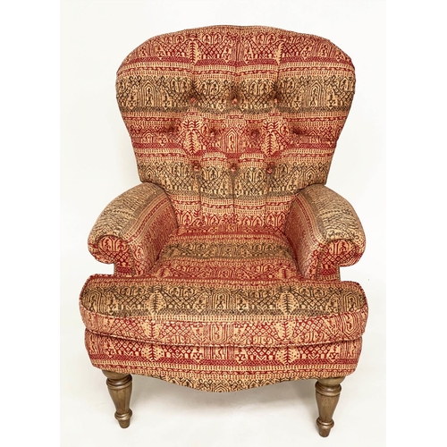 146 - ARMCHAIR, Victorian style deep buttoned spoon back, with Indian print upholstery.