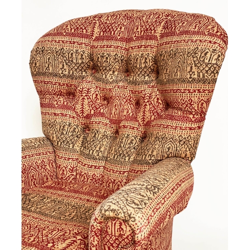 146 - ARMCHAIR, Victorian style deep buttoned spoon back, with Indian print upholstery.