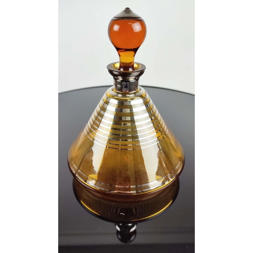 11 - VINTAGE AMBER COCKTAIL DECANTER with four glasses, with a number '16', on the base of the decanter a... 