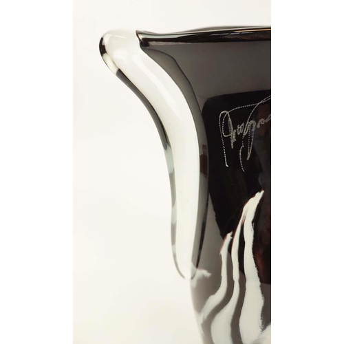 22 - A MURANO STYLE BLACK AND WHITE STUDIO GLASS VASE, two handled form, indistinctly signed to top rim, ... 