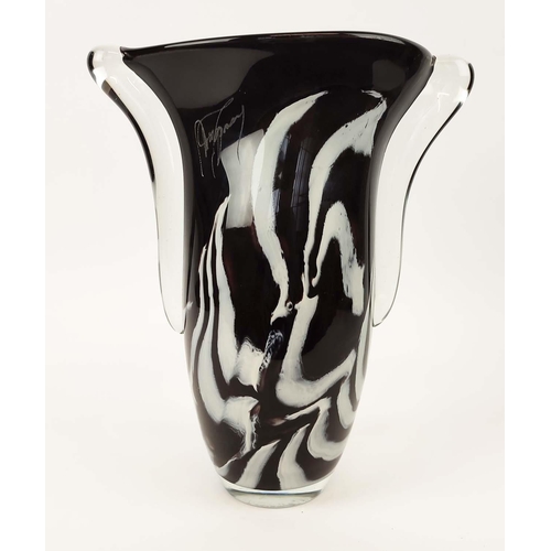 22 - A MURANO STYLE BLACK AND WHITE STUDIO GLASS VASE, two handled form, indistinctly signed to top rim, ... 