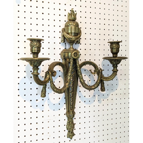 3 - WALL LIGHTS, two pairs, gilt bronze including a pair with draped swag and flamed finial urn, swagged... 