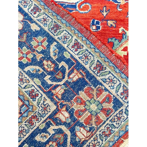 73 - ANTIQUE PERSIAN ZIEGLER CARPET, 300cm x 215cm.