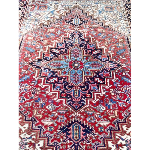 83 - ANTIQUE HERIZ CARPET, 250cm x 184cm.