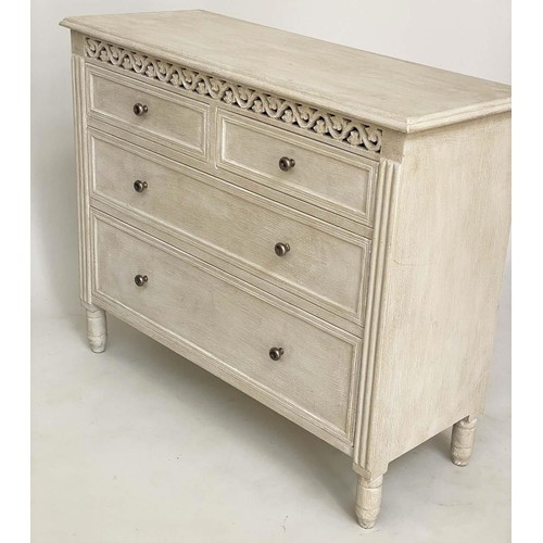 104 - COMMODE, French style traditionally grey painted with pierced frieze and four drawers, 75cm H x 89cm... 