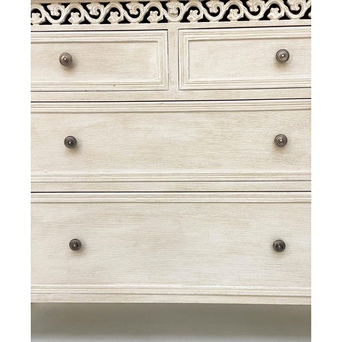 104 - COMMODE, French style traditionally grey painted with pierced frieze and four drawers, 75cm H x 89cm... 