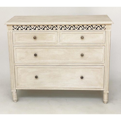 104 - COMMODE, French style traditionally grey painted with pierced frieze and four drawers, 75cm H x 89cm... 