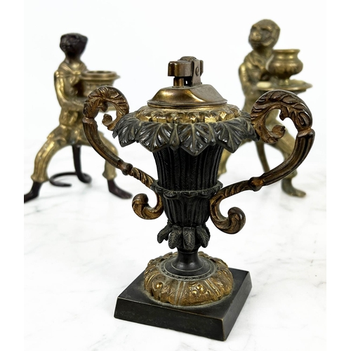 11 - ANTHROPOMORPHIC MONKEY CANDLESTICKS, a pair, and one other along with a cast bronze urn table lighte... 