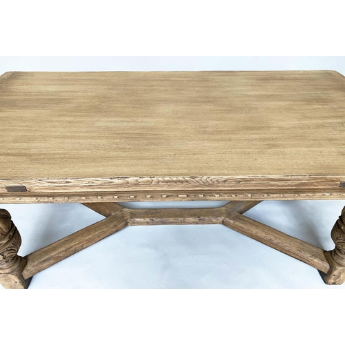 114 - DRAWLEAF EXTENDING DINING TABLE, English style oak, with notch carved frieze raised on broad carved ... 