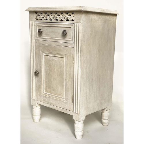 116 - BEDSIDE CABINETS, a pair, French traditionally grey painted with drawer, panelled door and pierced f... 