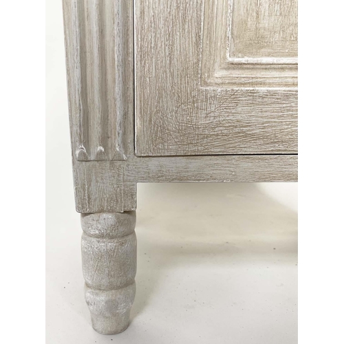 116 - BEDSIDE CABINETS, a pair, French traditionally grey painted with drawer, panelled door and pierced f... 