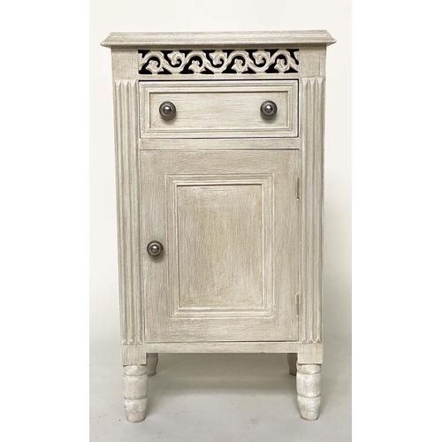 116 - BEDSIDE CABINETS, a pair, French traditionally grey painted with drawer, panelled door and pierced f... 