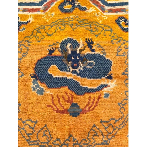 63 - ANTIQUE CHINESE PEKING DRAGON CARPET, 274cm x 274cm.