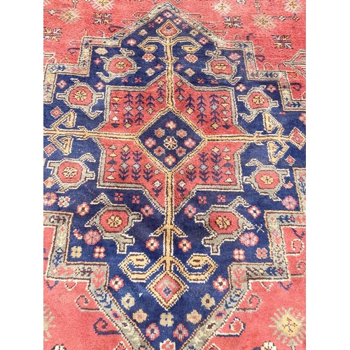 67 - ANTIQUE TURKISH OUSHAK CARPET, 430cm x 345cm.