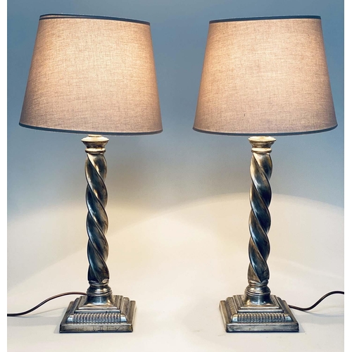 95 - TABLE LAMPS, a pair, silvered metal twist columns and plinth bases, with shades, 64cm H. (2)