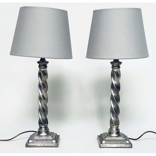 95 - TABLE LAMPS, a pair, silvered metal twist columns and plinth bases, with shades, 64cm H. (2)