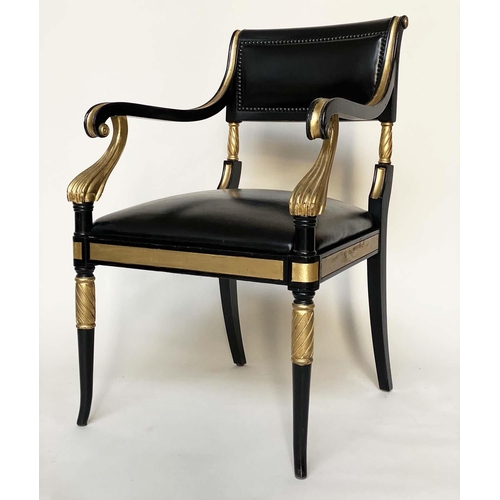 97 - ARMCHAIRS, a pair, Regency style lacquered and gilded with leather seats scroll arms and swept front... 