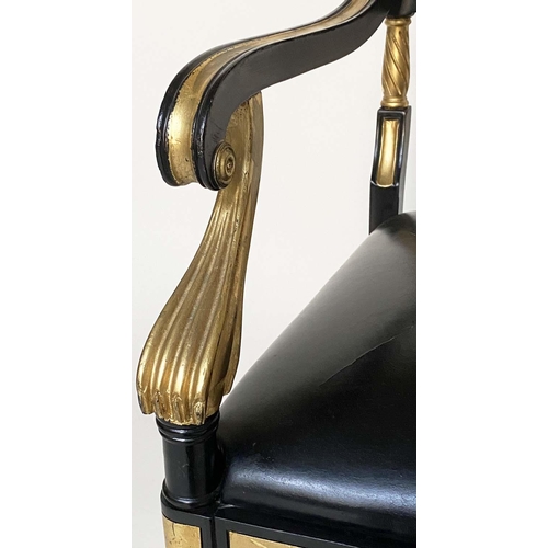 97 - ARMCHAIRS, a pair, Regency style lacquered and gilded with leather seats scroll arms and swept front... 