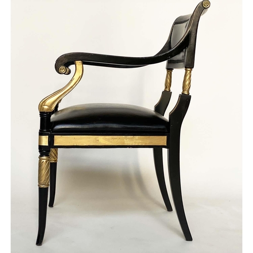 97 - ARMCHAIRS, a pair, Regency style lacquered and gilded with leather seats scroll arms and swept front... 