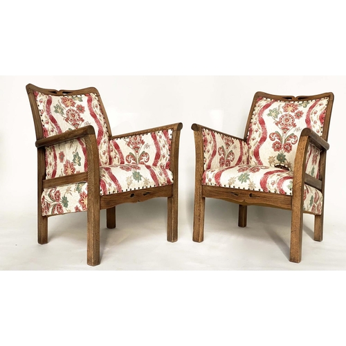 99 - ELBOW/ARMCHAIRS, a pair, early 20th century Arts and Crafts style pierced oak framed with old Englis... 