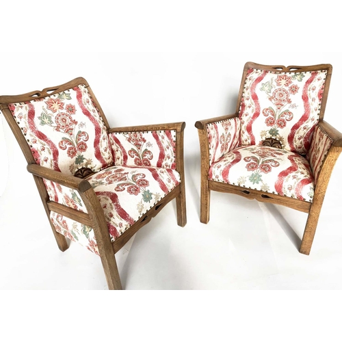 99 - ELBOW/ARMCHAIRS, a pair, early 20th century Arts and Crafts style pierced oak framed with old Englis... 