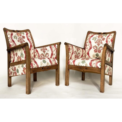 99 - ELBOW/ARMCHAIRS, a pair, early 20th century Arts and Crafts style pierced oak framed with old Englis... 