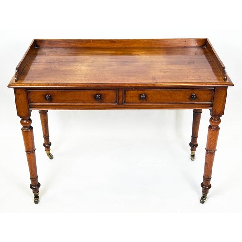 125 - WRITING TABLE, Victorian mahogany with two frieze drawers and galleried top raised on gun barrel tap... 