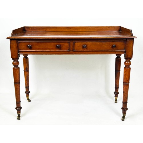 125 - WRITING TABLE, Victorian mahogany with two frieze drawers and galleried top raised on gun barrel tap... 