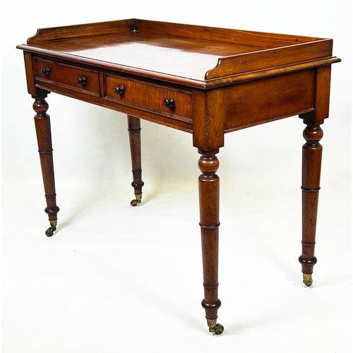 125 - WRITING TABLE, Victorian mahogany with two frieze drawers and galleried top raised on gun barrel tap... 