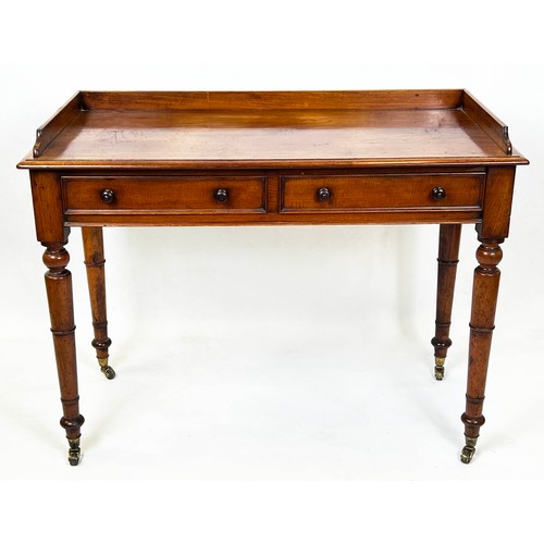 125 - WRITING TABLE, Victorian mahogany with two frieze drawers and galleried top raised on gun barrel tap... 